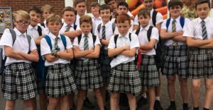 Boys wear skirts to defy school uniform policy